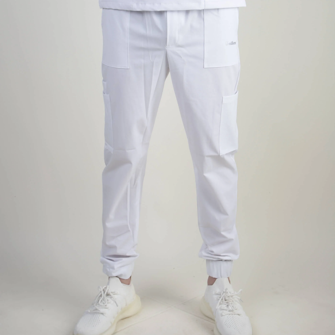 PIJAMA ANTIFLUIDOS BLANCO T MED CUELLO V CON BOLSAS